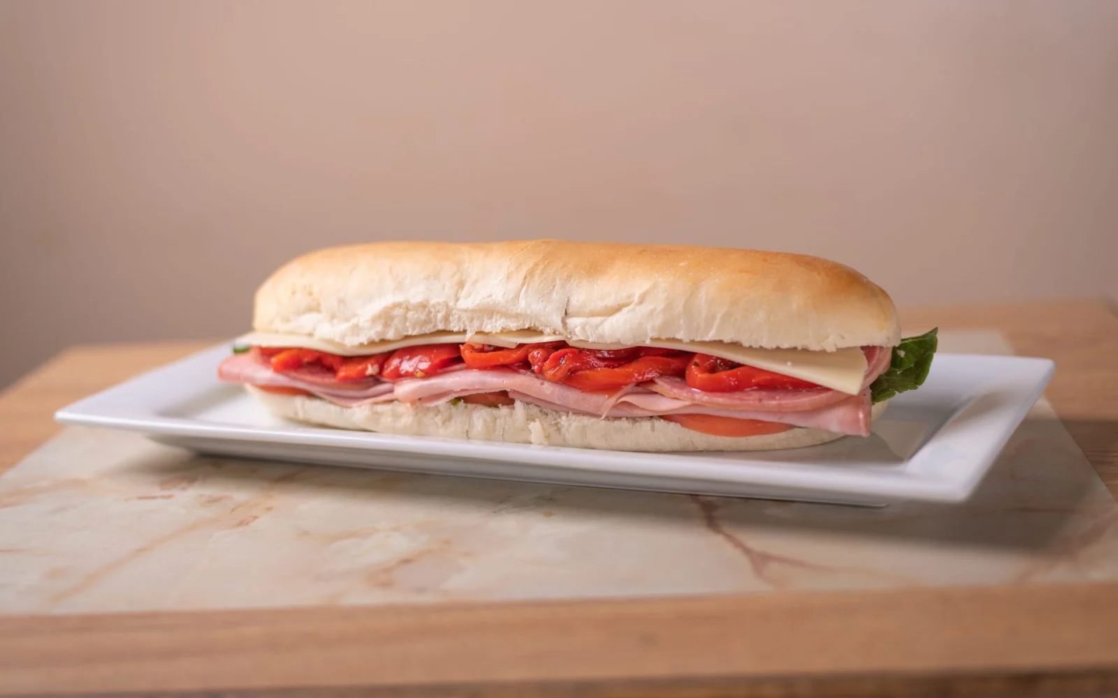 Italian sub with salami, ham, provolone and roasted red peppers